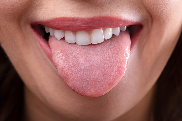 Oral Hygiene Basics: The Importance of Cleaning Your Tongue from Midtown Dental - The Gallery of Smiles in Houston, TX