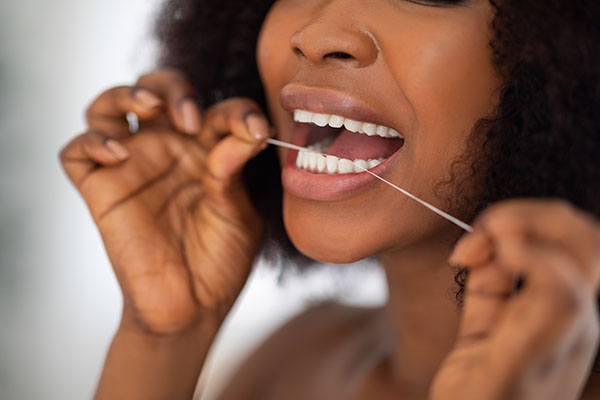Oral Hygiene Basics: Recommended Flossing Techniques from Midtown Dental - The Gallery of Smiles in Houston, TX